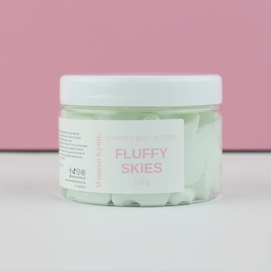Jar of 'Fluffy Skies' whipped body butter with a pink background