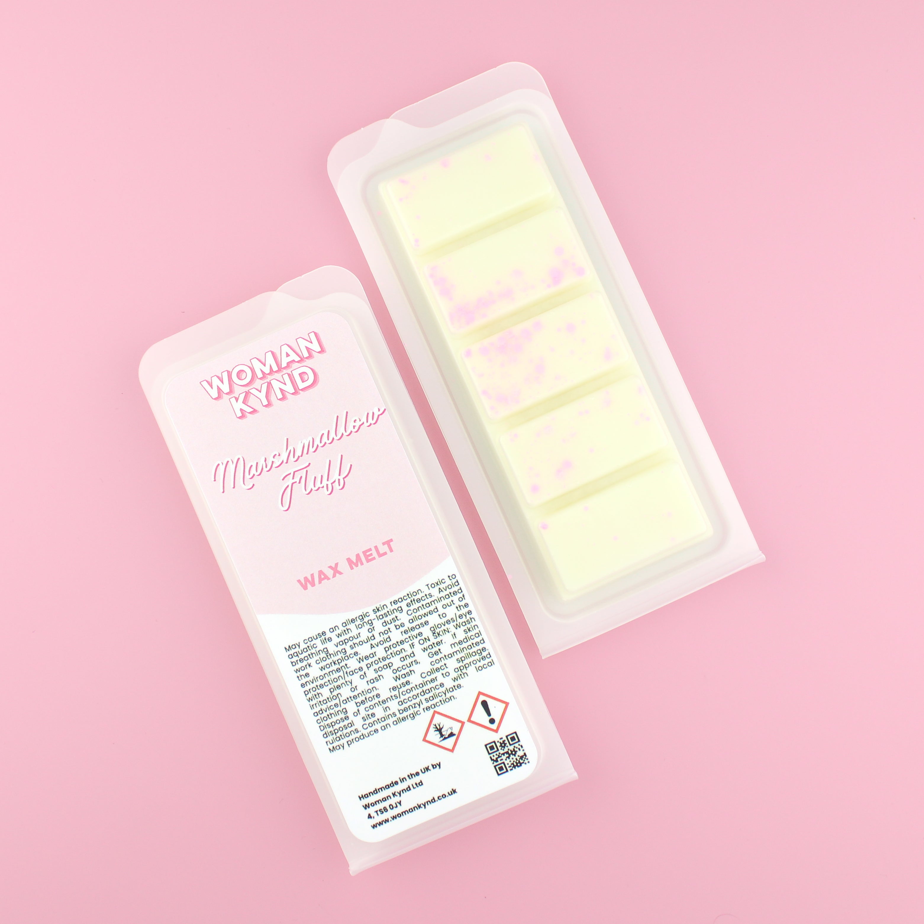 Two images of a Woman Kynd five segment pale yelow Wax Melt with pink glitter, both in a frosted clamshell. The first image displays the pink and white label with the words Woman Kynd Marshmallow Fluff Wax Melt and the CLP information, and the other image is of the reverse side showing the Wax Melt Itself. Both images are against a solid pink background.